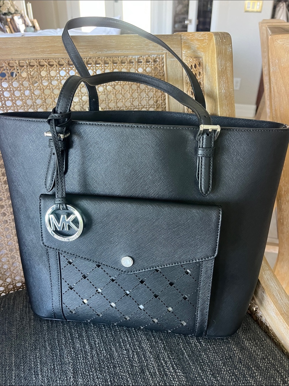 NWOT Michael Kors black Saffino leather tote w/distinctive cut out front pocket